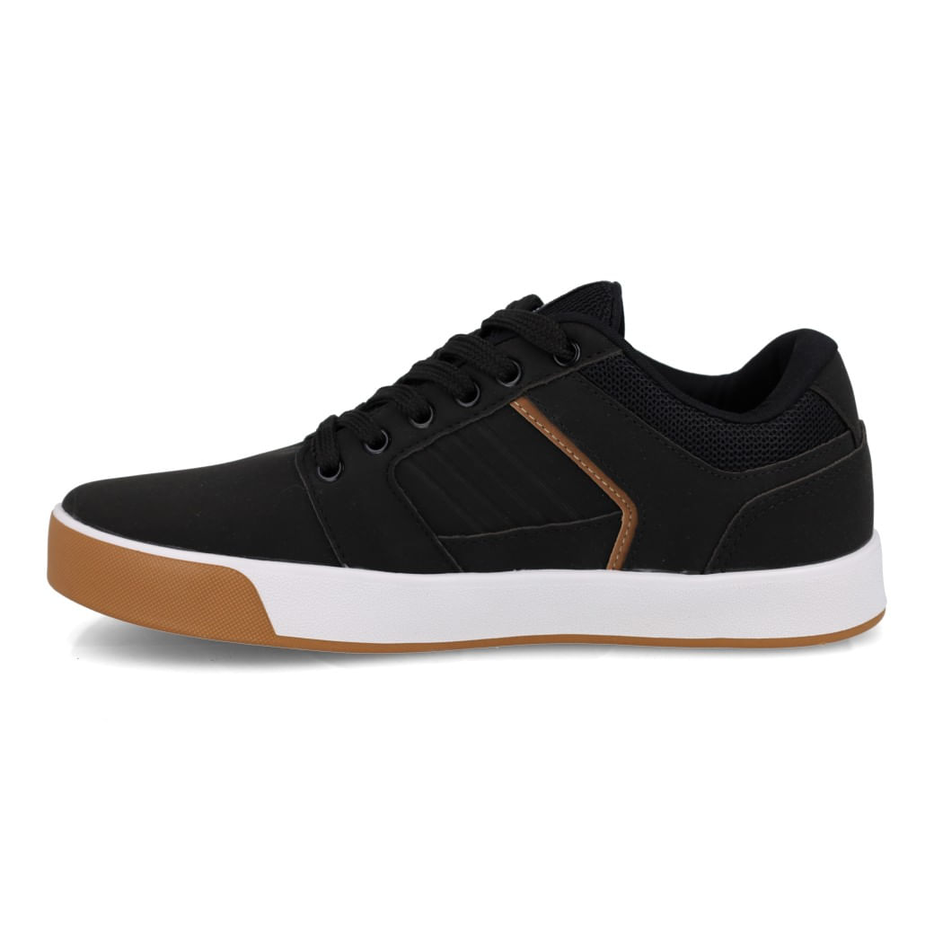 Tênis casual infantil Ollie Monster3 preto em destaque para ajuste e conforto.